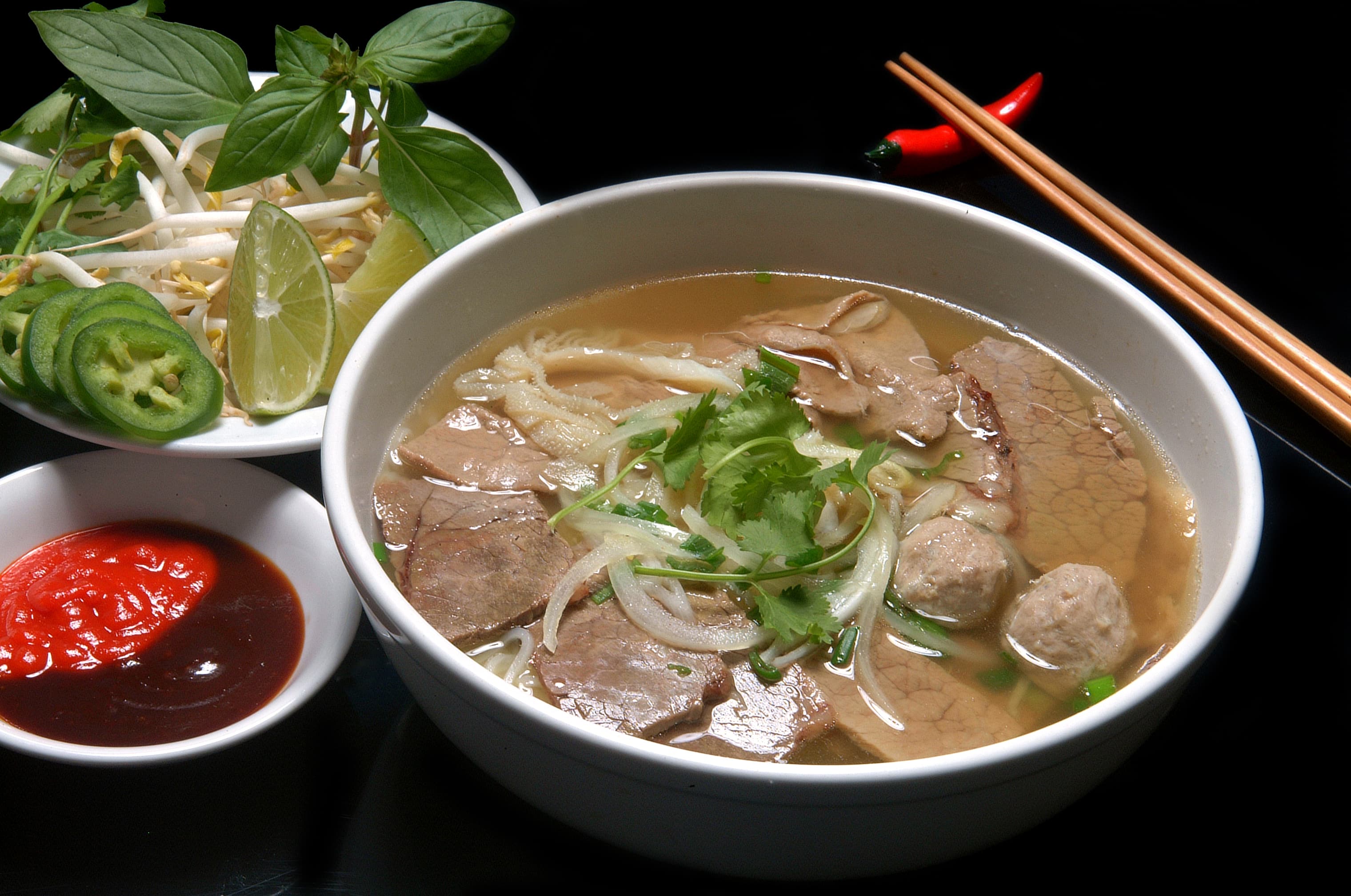 Fresh pho with herbs, bean sprouts, and lime — the Pho Tasty way